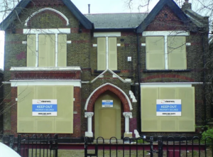 Boarded up property from Clearway